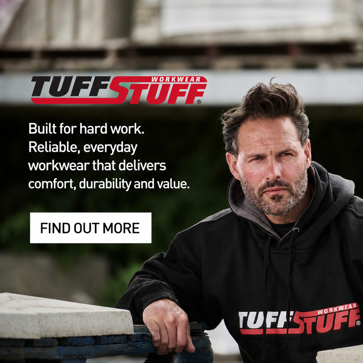 Tuﬀ Stuff workwear advertisement featuring a man in a black hoodie beside the large white headline about durable, reliable workwear and a 'FIND OUT MORE' button